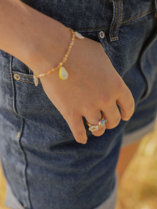 Bague 'FaceToFace' Oiseau bleu & fleur de poirier | NACH BIJOUX