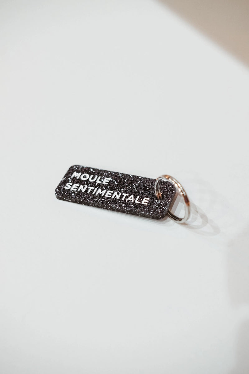 Porte-clés pailleté 'Moule sentimentale' Noir | PLUS DE LOVE