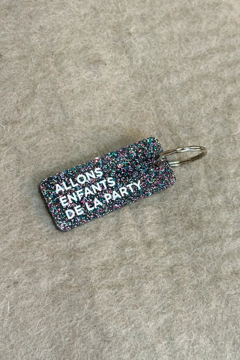 Porte-clés pailleté 'Allons enfants de la party' Noir multico | PLUS DE LOVE