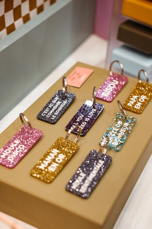 Porte-clés pailleté 'Va te faire cuire le cul' Bleu | PLUS DE LOVE