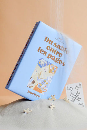 Puzzle 500 pièces 'Du sable entre les pages' | JOUR FÉRIÉ