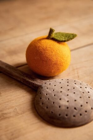 Orange en laine feutrée | MUSKHANE