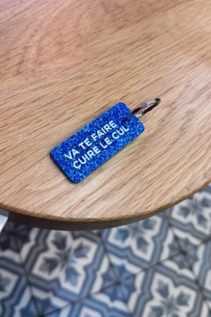 Porte-clés pailleté 'Va te faire cuire le cul' Bleu | PLUS DE LOVE