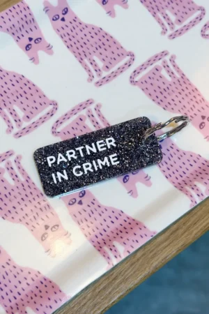 Porte-clés pailleté 'Partner in crime' Noir | PLUS DE LOVE